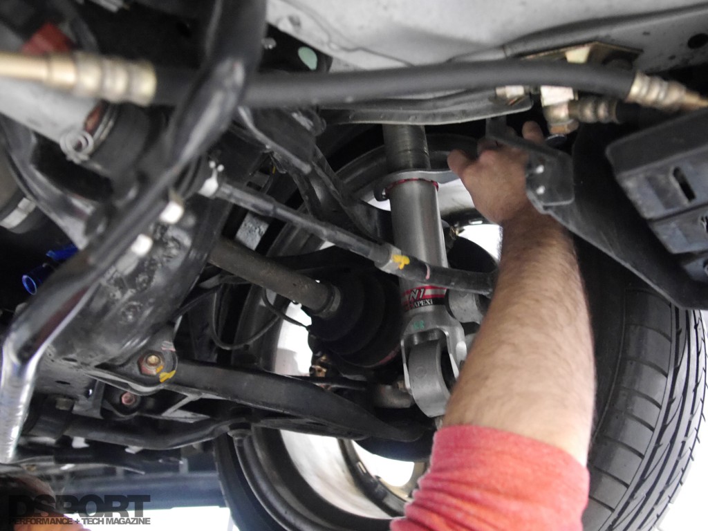 Adjusting coil overs